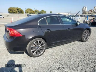 2015 Volvo S60 T5 Drive-E Premier z VIN YV126MFK6F2334600, wystawiony jako Copart lot #61436275 z przebiegiem 117 878 mil mil oraz Czysty tytuł • Clean title. Historia ofert i sprzedaży dostępna na DreamBid. Obrazek 3.