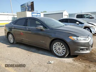 2015 Ford Fusion SE Hybrid with VIN 3FA6P0LU1FR136933, listed as a Copart auction lot 61915914 with 153,614 mi miles and Salvage Title. Bid and sale history available at carsss.com. Image 4.