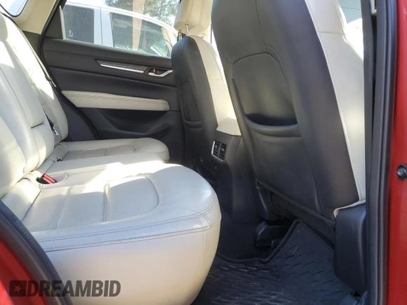 2018 Mazda CX-5 Grand Touring with VIN JM3KFADM1J1454982, listed as a Copart auction lot 49162495 with 109,559 mi miles and Salvage Title. Bid and sale history available at DreamBid. Image 11.