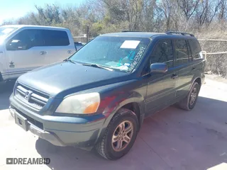 2004 Honda Pilot EX with VIN 2HKYF18574H532409, listed as a IAAI auction lot 41701760 with 302,949 mi miles. Bid and sale history available at carsss.com. Image 2.