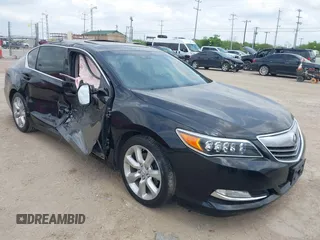 2014 Acura RLX with VIN JH4KC1F36EC002427, listed as a IAAI auction lot 42099583 with 114,671 mi miles. Bid and sale history available at carsss.com. Image 1.