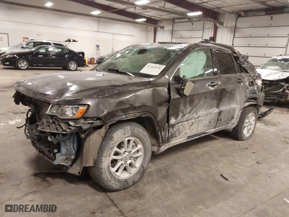 2018 Jeep Grand Cherokee Laredo E with VIN 1C4RJFAG4JC313054, listed as a IAAI auction lot 41469450 with 142,929 mi miles. Bid and sale history available at carsss.com. Image 18.