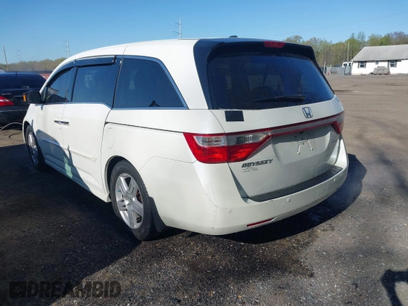 2012 Honda Odyssey Touring with VIN 5FNRL5H93CB146753, listed as a IAAI auction lot 41984850 with 155,309 mi miles and . Bid and sale history available at DreamBid. Image 3.