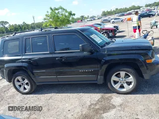 2014 Jeep Patriot Limited z VIN 1C4NJPCB2ED533427, wystawiony jako IAAI lot #42456778 z przebiegiem 120 649 mil mil oraz . Historia ofert i sprzedaży dostępna na DreamBid. Obrazek 13.