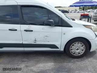 2014 Ford Transit Connect XLT with VIN NM0LS7F79E1140809, listed as a IAAI auction lot 42006811 with 183,152 mi miles. Bid and sale history available at carsss.com. Image 14.