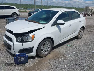 2015 Chevrolet Sonic LT with VIN 1G1JC5SH2F4140332, listed as a IAAI auction lot 42197626 with 105,850 mi miles and . Bid and sale history available at DreamBid. Image 2.
