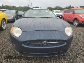 2007 Jaguar XK with VIN SAJDA44B075B03695, listed as a Copart auction lot 74978034 with 0 mi miles and Salvage Title. Bid and sale history available at carsss.com. Image 5.