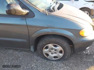 2003 Dodge Caravan SE with VIN 1D4GP24313B150883, listed as a IAAI auction lot 41760786 with 165,718 mi miles. Bid and sale history available at carsss.com. Image 6.