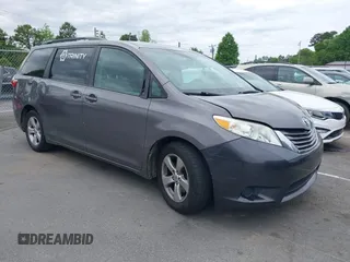 2015 Toyota Sienna LE AAS with VIN 5TDKK3DC5FS610247, listed as a IAAI auction lot 42033460 with 260,962 mi miles and . Bid and sale history available at DreamBid. Image 1.