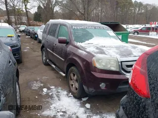 2011 Honda Pilot EX-L with VIN 5FNYF4H56BB024171, listed as a IAAI auction lot 41442621 with 105,104 mi miles. Bid and sale history available at carsss.com. Image 1.