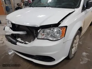 2018 Dodge Grand Caravan SE with VIN 2C4RDGBG0JR180361, listed as a IAAI auction lot 41064126 with 135,841 mi miles. Bid and sale history available at carsss.com. Image 6.