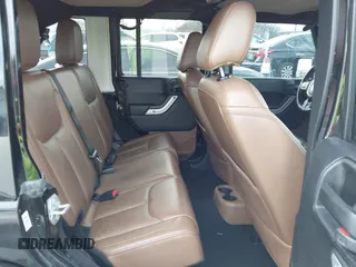 2016 Jeep Wrangler Unlimited 75th Anniversary with VIN 1C4BJWEG1GL221873, listed as a IAAI auction lot 41635788 with 148,493 mi miles. Bid and sale history available at carsss.com. Image 8.