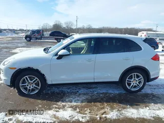 2014 Porsche Cayenne with VIN WP1AA2A2XELA95734, listed as a IAAI auction lot 41583908 with 95,751 mi miles and . Bid and sale history available at DreamBid. Image 14.