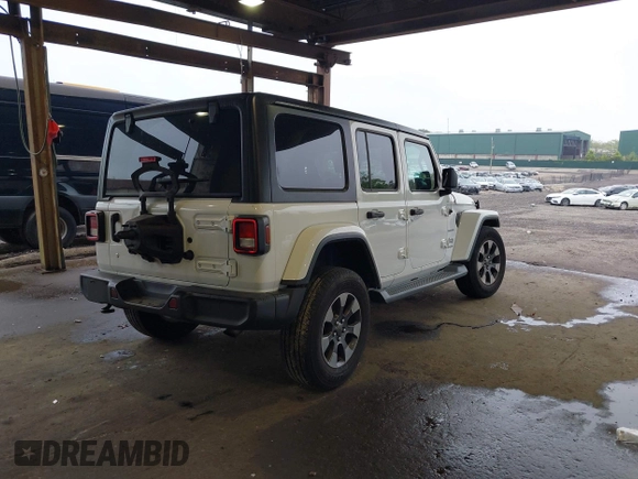 2018 Jeep Wrangler Unlimited Sahara with VIN 1C4HJXEG3JW116404, listed as a IAAI auction lot 42152506 with 57,727 mi miles and . Bid and sale history available at DreamBid. Image 4.