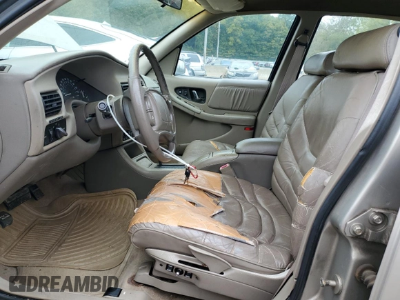 1996 Buick Regal Custom with VIN 2G4WB52K9T1483136, listed as a Copart auction lot 72785524 with 60,484 mi miles and Clean title. Bid and sale history available at DreamBid. Image 7.