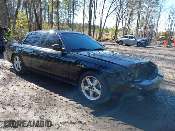 2003 Mercury Marauder with VIN 2MEHM75V33X628952, listed as a IAAI auction lot 41534323 with 92,228 mi miles. Bid and sale history available at carsss.com. Image 1.