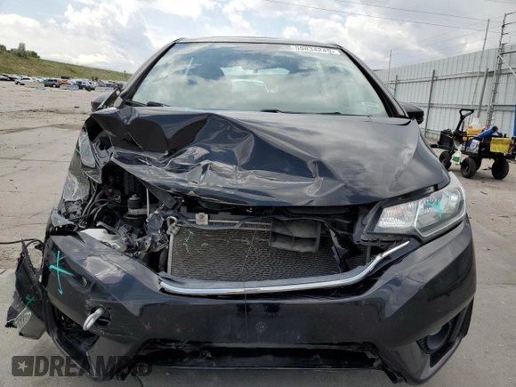 2015 Honda Fit EX-L z VIN 3HGGK5H80FM704920, wystawiony jako Copart lot #59834245 z przebiegiem 86 415 mil mil oraz Szkoda całkowita • Salvage title. Historia ofert i sprzedaży dostępna na DreamBid. Obrazek 5.