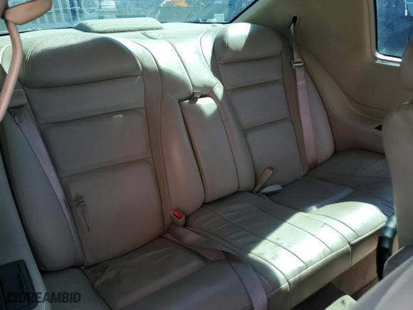 2000 Cadillac Eldorado with VIN 1G6EL12Y7YU135375, listed as a Copart auction lot 69503944 with 105,703 mi miles and Salvage Title. Bid and sale history available at carsss.com. Image 10.