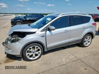 2015 Ford Escape Titanium with VIN 1FMCU0J98FUB04747, listed as a Copart auction lot 59221825 with 136,493 mi miles and Salvage title. Bid and sale history available at DreamBid. Image 1.