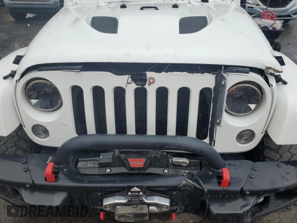 2015 Jeep Wrangler Unlimited Rubicon Hard Rock с VIN 1C4HJWFG8FL647910, выставлен на аукционе Copart как лот 46716605 с пробегом 48 139 миль миль и Списание • Salvage title. История ставок и продаж доступна на DreamBid. Изображение 11.