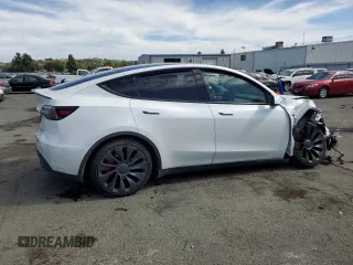 2022 Tesla Model Y Performance с VIN 7SAYGDEF2NF405596, выставлен на аукционе Copart как лот 52868195 с пробегом Не указан миль и Списание • Salvage title. История ставок и продаж доступна на DreamBid. Изображение 3.