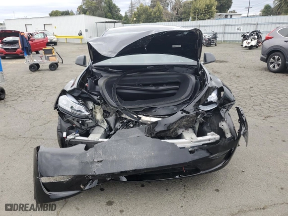 2025 Tesla Model Y Long Range with VIN 7SAYGDEE6SF308226, listed as a Copart auction lot 48006865 with 2,291 mi miles and Salvage Title. Bid and sale history available at carsss.com. Image 5.