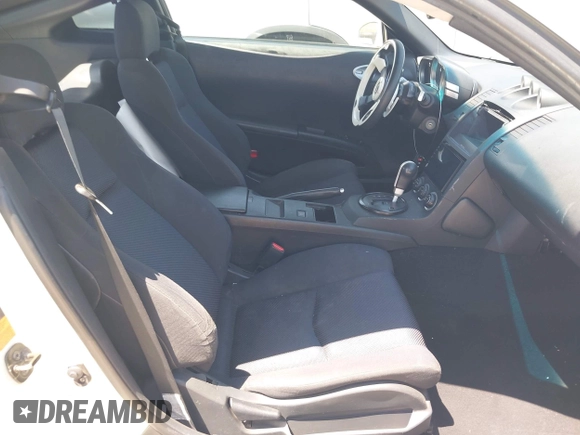2004 Nissan 350Z Touring with VIN JN1AZ34E34T060024, listed as a IAAI auction lot 42327915 with 96,197 mi miles and . Bid and sale history available at DreamBid. Image 5.