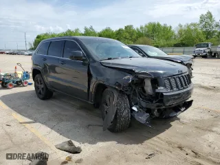 2015 Jeep Grand Cherokee Laredo with VIN 1C4RJFAG5FC724874, listed as a Copart auction lot 52462214 with 99,650 mi miles and Salvage Title. Bid and sale history available at carsss.com. Image 4.