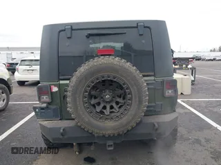 2008 Jeep Wrangler Unlimited Rubicon with VIN 1J8GA69168L591089, listed as a IAAI auction lot 41487746 with 161,916 mi miles and . Bid and sale history available at DreamBid. Image 17.