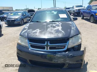 2014 Dodge Avenger SE with VIN 1C3CDZAB1EN133550, listed as a IAAI auction lot 42033001 with 137,592 mi miles. Bid and sale history available at carsss.com. Image 12.