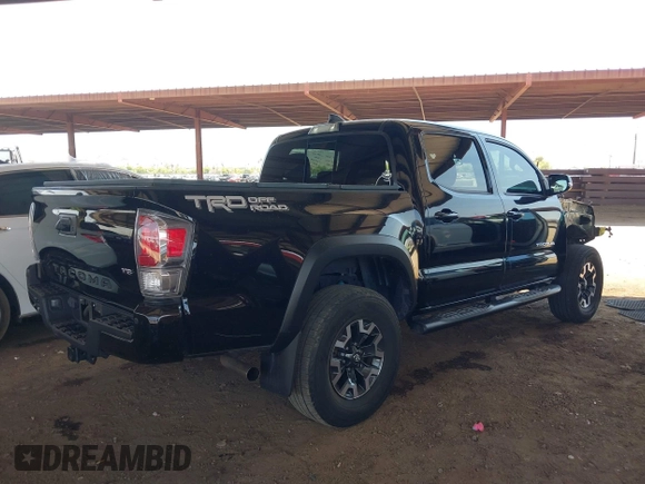 2021 Toyota Tacoma SR5 with VIN 5TFAZ5CN1MX111605, listed as a IAAI auction lot 42465381 with 67,307 mi miles and . Bid and sale history available at DreamBid. Image 4.