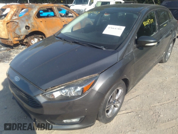 2017 Ford Focus SE with VIN 1FADP3FE3HL295192, listed as a IAAI auction lot 42664709 with 47,589 mi miles and . Bid and sale history available at DreamBid. Image 2.