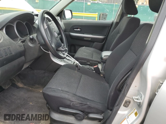 2008 Suzuki Grand Vitara w/Spare & Cargo Covers with VIN JS3TD941784100899, listed as a Copart auction lot 62581725 with 104,502 mi miles and Salvage title. Bid and sale history available at DreamBid. Image 7.