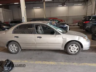 2001 Honda Civic LX z VIN 2HGES16571H556376, wystawiony jako IAAI lot #42203997 z przebiegiem 175 778 mil mil oraz . Historia ofert i sprzedaży dostępna na DreamBid. Obrazek 13.