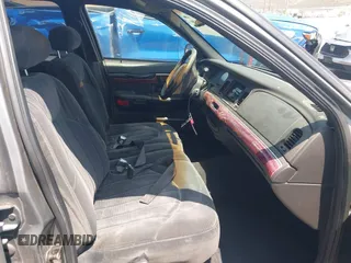 2000 Mercury Grand Marquis GS z VIN 2MEFM74W8YX662409, wystawiony jako IAAI lot #42438486 z przebiegiem 191 248 mil mil oraz . Historia ofert i sprzedaży dostępna na DreamBid. Obrazek 5.