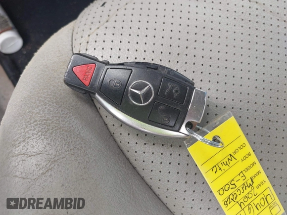 2004 Mercedes-Benz E 500 z VIN WDBUF70J94A404611, wystawiony jako IAAI lot #42286145 z przebiegiem 161 544 mil mil oraz . Historia ofert i sprzedaży dostępna na DreamBid. Obrazek 11.