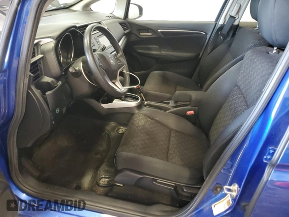 2017 Honda Fit LX with VIN JHMGK5H57HS010285, listed as a Copart auction lot 62520975 with 93,965 mi miles and Salvage title. Bid and sale history available at DreamBid. Image 7.
