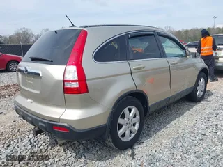 2007 Honda CR-V EX-L with VIN JHLRE38777C031723, listed as a IAAI auction lot 41805468 with 166,294 mi miles. Bid and sale history available at carsss.com. Image 4.