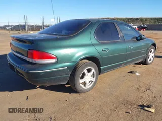 1997 Chrysler Cirrus LXi z VIN 1C3EJ56H2VN720573, wystawiony jako IAAI lot #41250503 z przebiegiem 176 046 mil mil oraz . Historia ofert i sprzedaży dostępna na DreamBid. Obrazek 4.