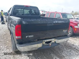 2003 Ford F-150 XL with VIN 2FTRX18W73CA80587, listed as a IAAI auction lot 42119924 with 222,990 mi miles. Bid and sale history available at carsss.com. Image 6.