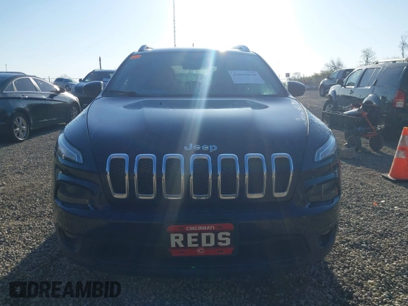 2015 Jeep Cherokee Latitude with VIN 1C4PJMCB1FW709560, listed as a IAAI auction lot 42035619 with 162,354 mi miles. Bid and sale history available at carsss.com. Image 12.