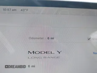 2025 Tesla Model Y Long Range with VIN 7SAYGDED0SA357488, listed as a IAAI auction lot 41550514 with 6 mi miles and . Bid and sale history available at DreamBid. Image 11.