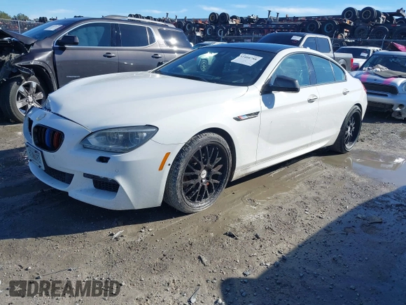 2013 BMW 6 Series 650i xDrive with VIN WBA6B4C59DD098329, listed as a IAAI auction lot 41404788 with 139,677 mi miles. Bid and sale history available at carsss.com. Image 17.