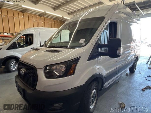 2023 Ford Transit Cargo with VIN 1FTBR1X83PKC02653, listed as a IAAI auction lot 42789310 with 242 mi miles and . Bid and sale history available at DreamBid. Image 7.