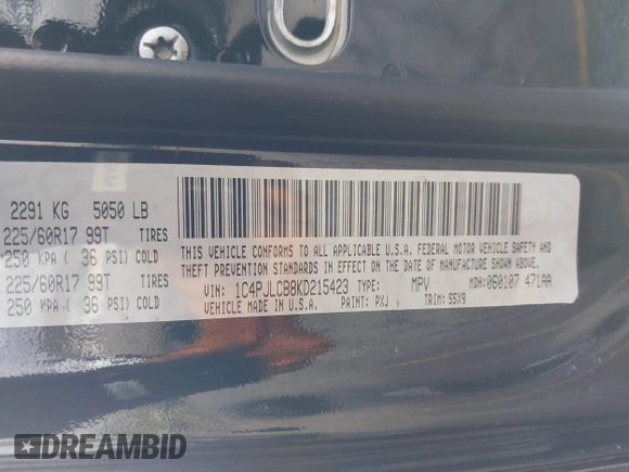 2019 Jeep Cherokee Latitude with VIN 1C4PJLCB8KD215423, listed as a IAAI auction lot 41911882 with 76,965 mi miles. Bid and sale history available at carsss.com. Image 9.