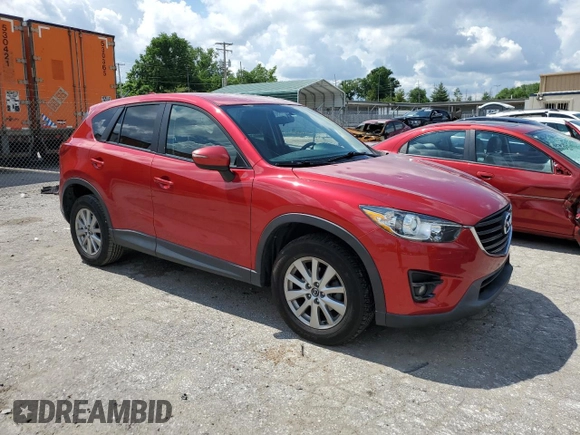 2016 Mazda CX-5 Touring with VIN JM3KE2CY0G0627886, listed as a Copart auction lot 55207054 with 95,884 mi miles and Salvage Title. Bid and sale history available at carsss.com. Image 4.