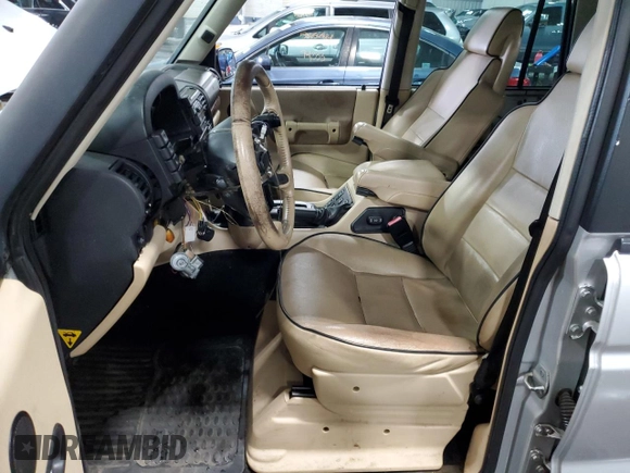 2003 Land Rover Discovery with VIN SALTY16493A801832, listed as a Copart auction lot 58690064 with 125,569 mi miles and Salvage Title. Bid and sale history available at DreamBid. Image 7.