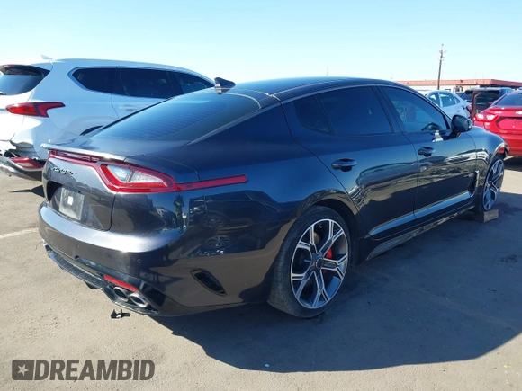 2019 Kia Stinger GT with VIN KNAE35LC3K6059198, listed as a IAAI auction lot 41599686 with 82,886 mi miles. Bid and sale history available at carsss.com. Image 4.