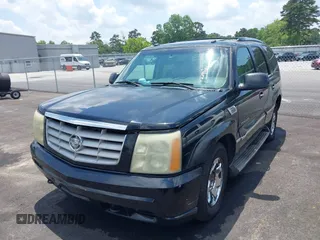 2003 Cadillac Escalade z VIN 1GYEC63T73R187253, wystawiony jako IAAI lot #42299186 z przebiegiem 288 373 mil mil oraz . Historia ofert i sprzedaży dostępna na DreamBid. Obrazek 2.