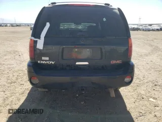 2002 GMC Envoy SLT with VIN 1GKDT13S022107749, listed as a Copart auction lot 59548544 with 221,224 mi miles and Clean Title. Bid and sale history available at DreamBid. Image 6.